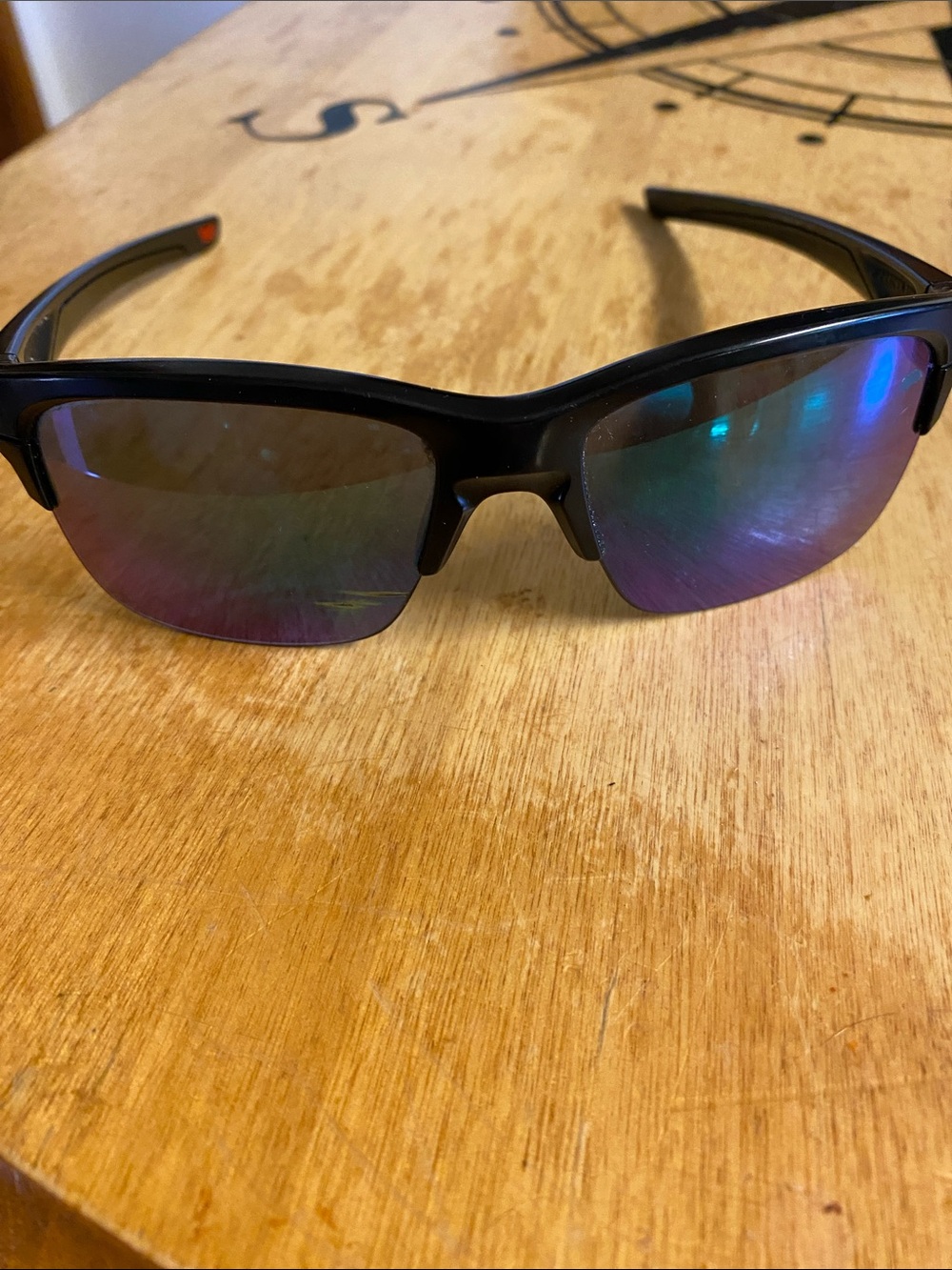 Oakley Black Sunglasses with Mirrored Blue-Purple Lenses